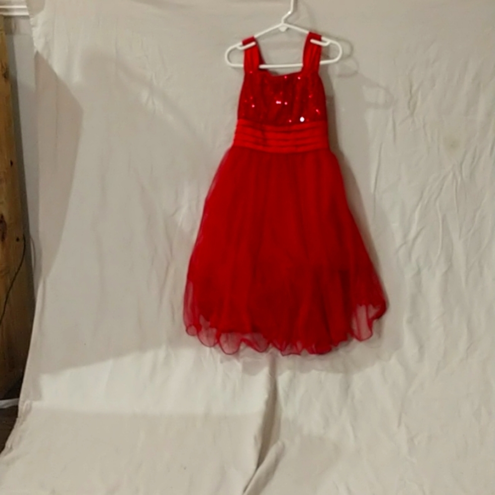Dress brand is My Michelle the size is 10 and the color is red .
